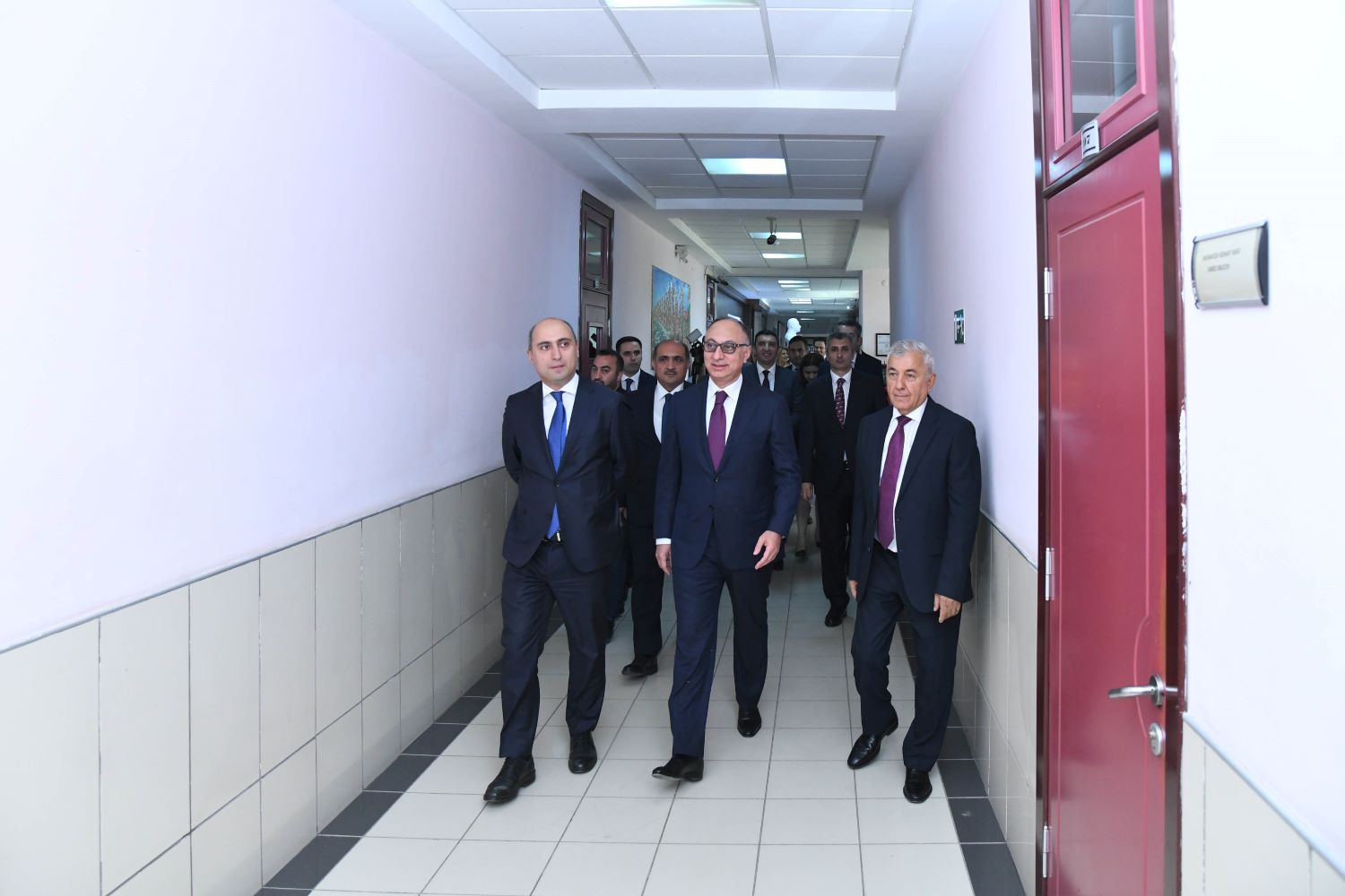 Minister Emin Amrullayev and Chairman of FSA Goshgar Tahmazli get acquainted with BEU laboratories